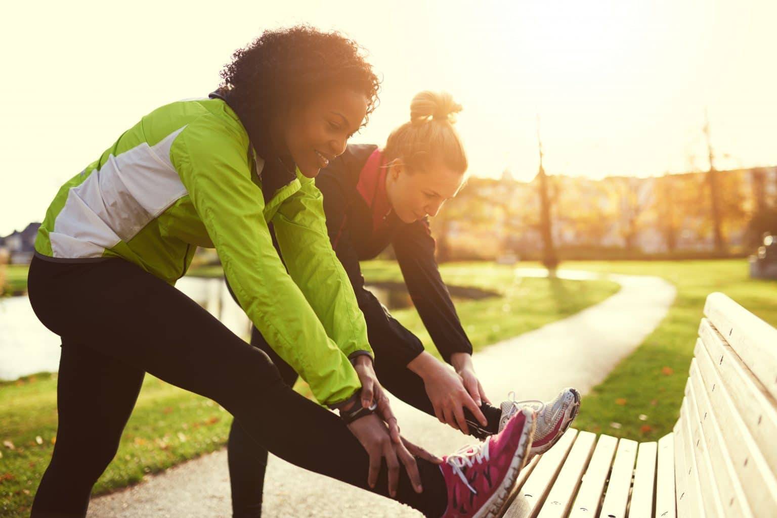 two women stretching exercise