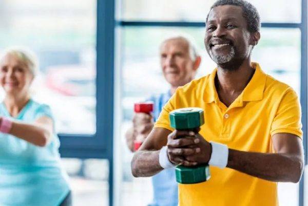 group of older adults weight training