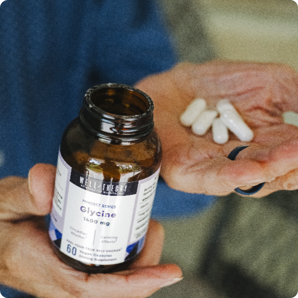 A person holds a "Glycine 1400 mg" bottle and capsules, emphasizing natural wellness supplements.