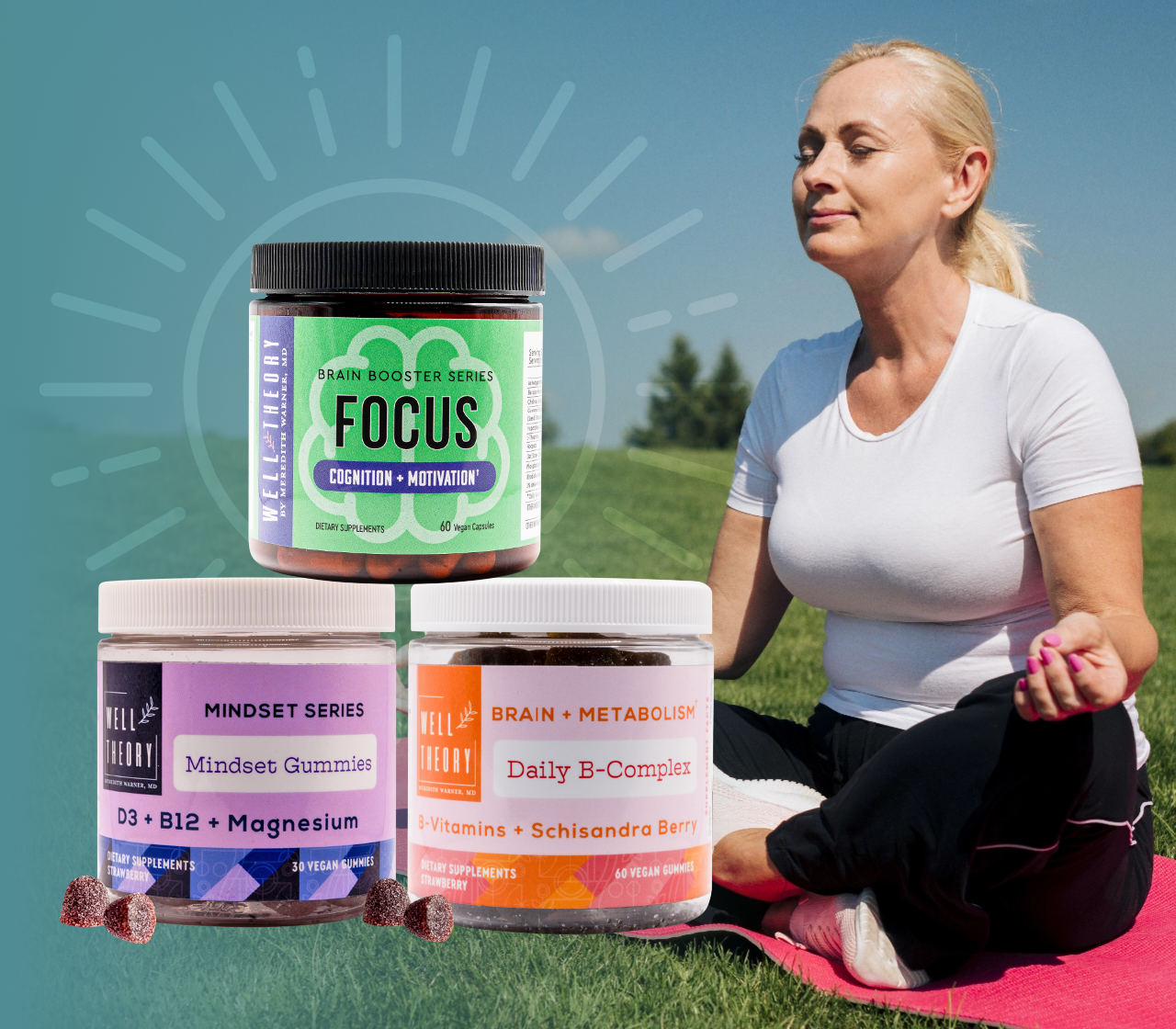 A woman sits cross-legged on grass, eyes closed, beside three supplements: Focus, Mindset Gummies, and Daily B-Complex.